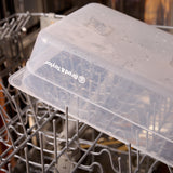 Proofing container on a dishwasher rack.