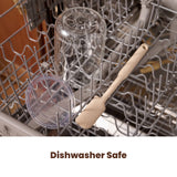 Small sourdough starter jar and starter spatula in a dishwasher rack.